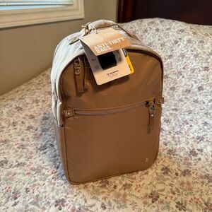 BRAND NEW Pacsafe W 10L Anti-Theft Backpack with tags, Taupe/Beige/Brown